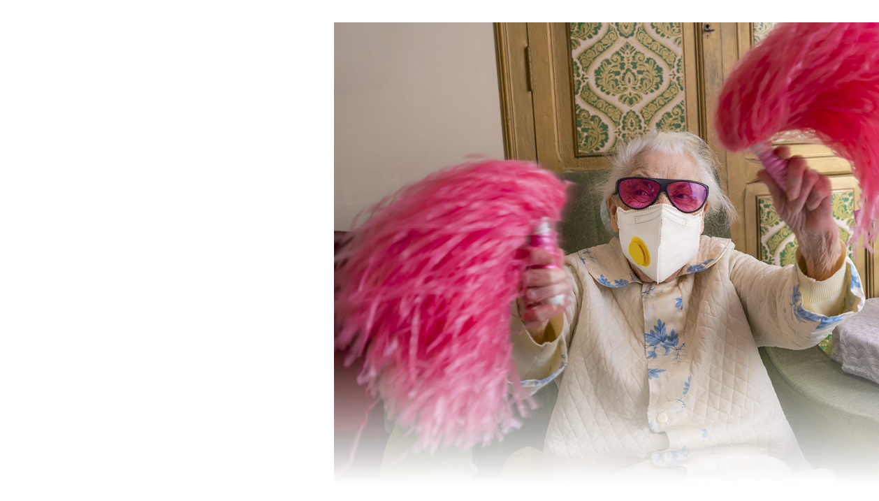 Coronavirus COVID-19 pandemic confinement with mask Cheerleader elderly woman